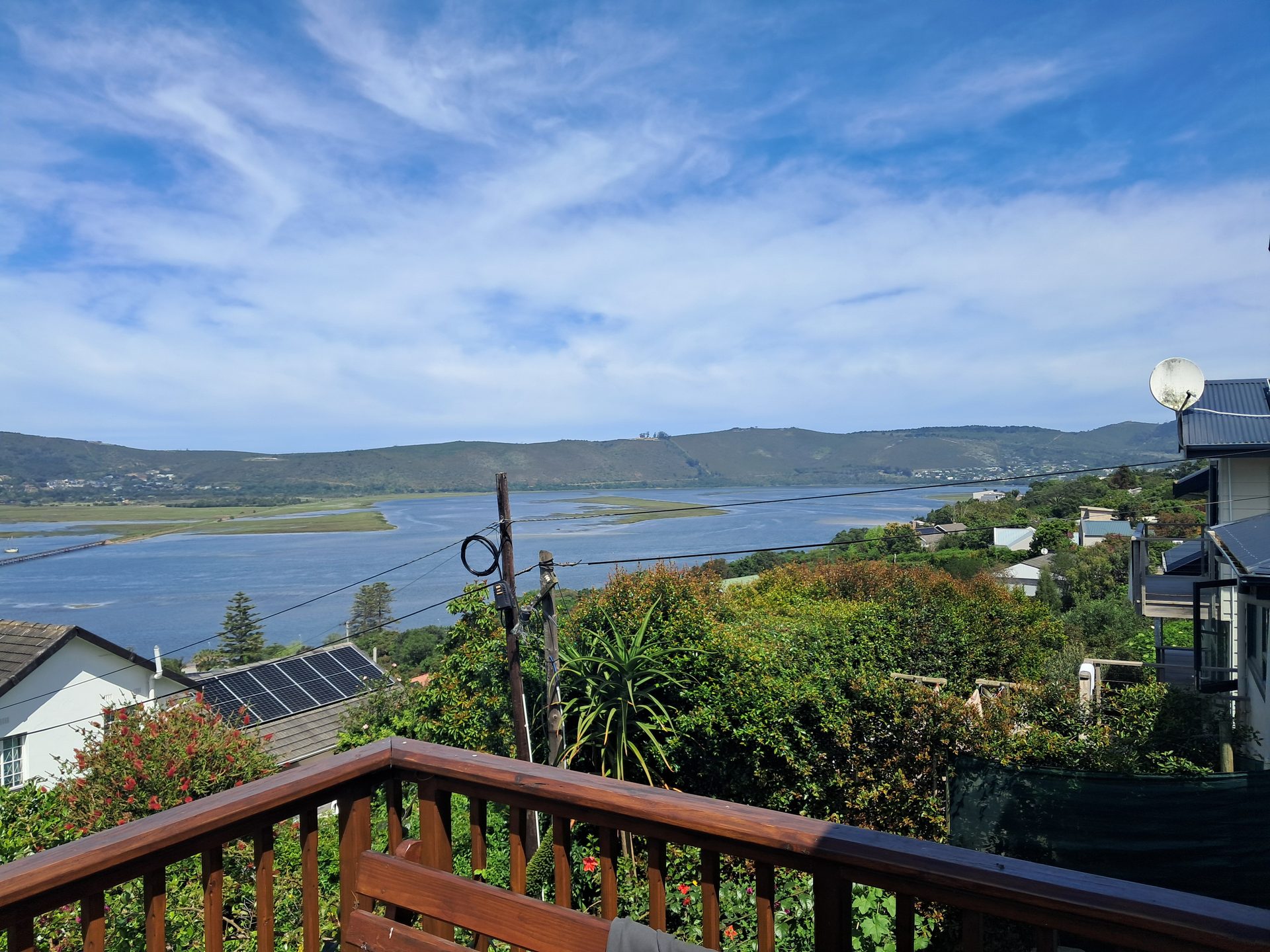 Knysna Lagoon and green hills panorama from the deck at Knysna Paradise Guesthouse